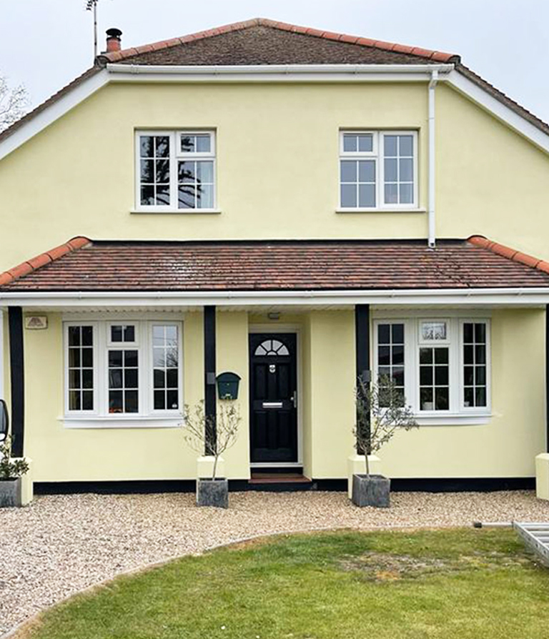 off-white color wall, white painted frame for window and black painted for door exterior painting services