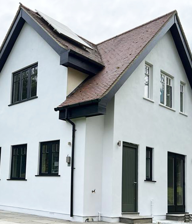 white wall with black window and door frame exterior painting services 2